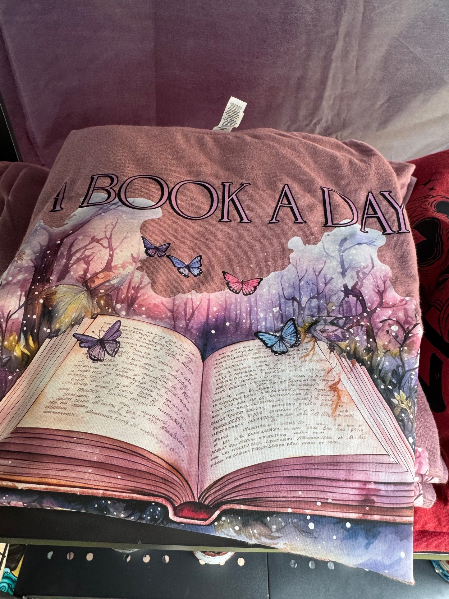 A Book A Day Keeps Reality Away