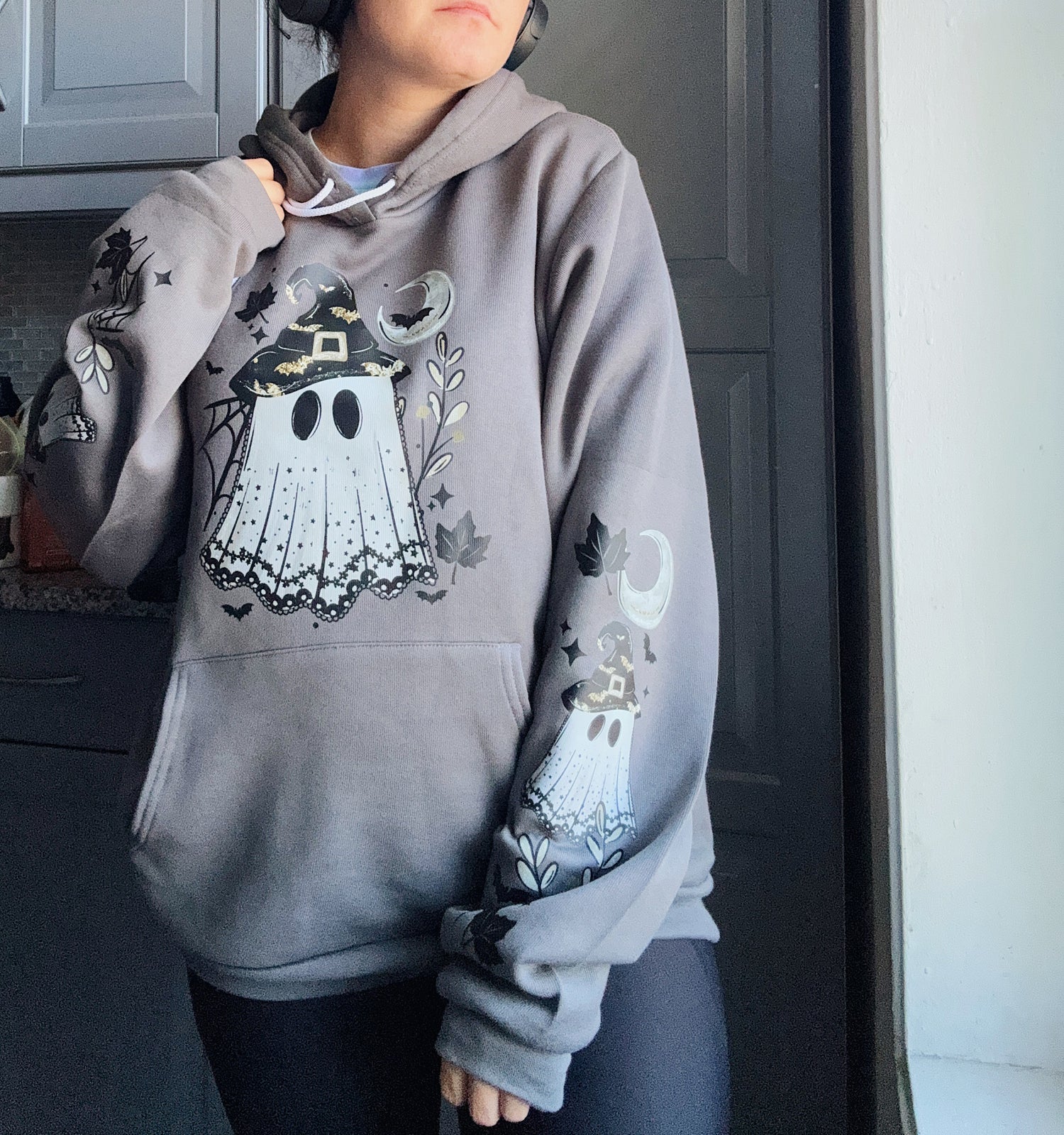Asphalt witchy ghost hoodie with crescent moons, bats and coordinating graphics printed down both sleeves